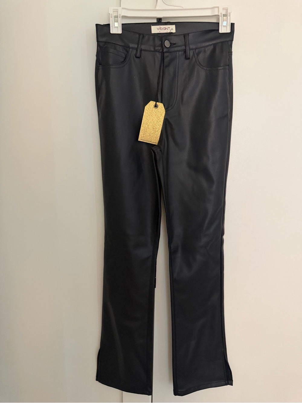 Vibrant Black Faux Leather Pants with Cream Nail Accent